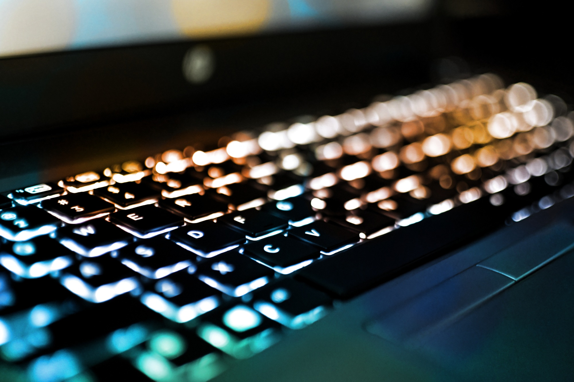 Computer Keyboard with lights and visual effects - concept information data internet