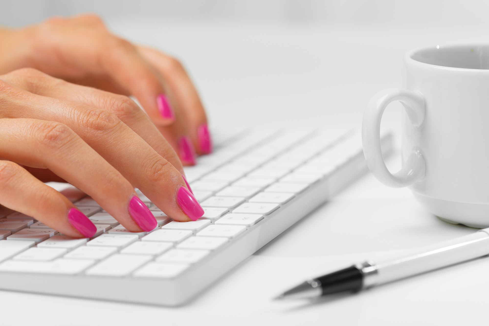 Woman's hands on a keyboard